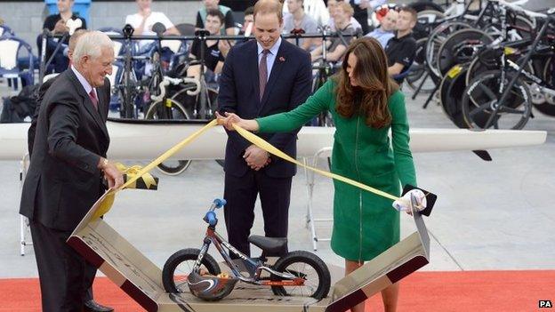 The Duke and Duchess of Cambridge receiving an Avanti Lil Ripper bike for Prince George