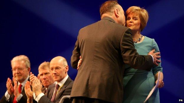 Nicola Sturgeon is greeted by Alex Salmond