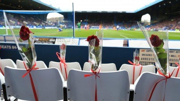 96 blue seats at the Leppings Lane end of Hillsborough are replaced by 96 white seats to represent the 96 Liverpool fans who died at the Hillsborough disaster