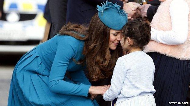 The Duchess receives a traditional Maori welcome called a "hongi" from five-year-old Mataawhio Matahaere Vieint at Dunedin International Airport