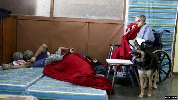 Residents gather in a shelter in Valparaiso, April 13, 2014.