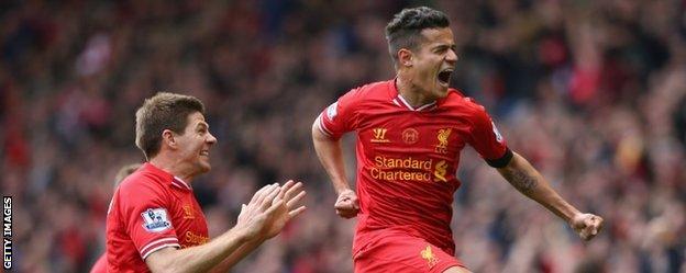 Philippe Coutinho celebrates after scoring Liverpool's winner