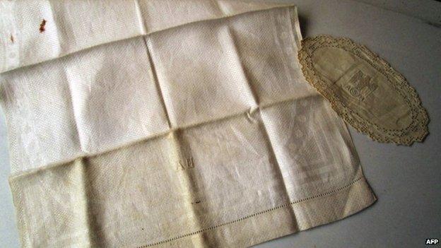 This image provided by French auction House Vermot de Pas shows a napkin bearing Adolf Hitler's initials on 14 April 2014