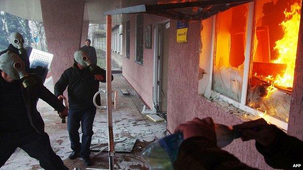 Pro-Russia protesters storm regional police building in eastern Ukrainian city of Horlivka, near Donetsk. 14 April 2014