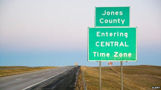 Signpost between Jones and Jackson county, South Dakota, marking the start of the central time zone