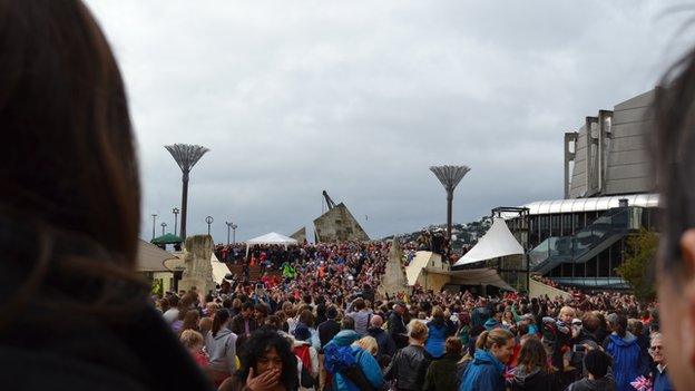 Grey clouds, but at least the rain had stopped just before the royals got out of their car at Wellington's Civic Square