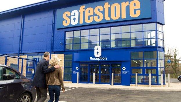 A couple enter a self-storage unit in Staines