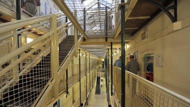 Prisoners in a cell block at Wormwood Scrubs, a Category B prison in London