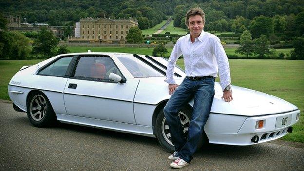 Richard Hammond sat on a car