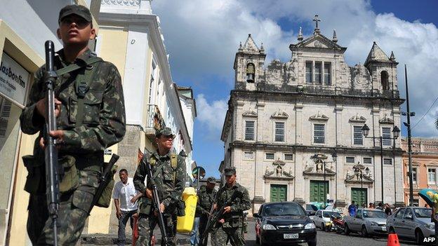 Brazilian soldiers patrol the historic centre of Salvador, Bahia, on February 7, 2012.