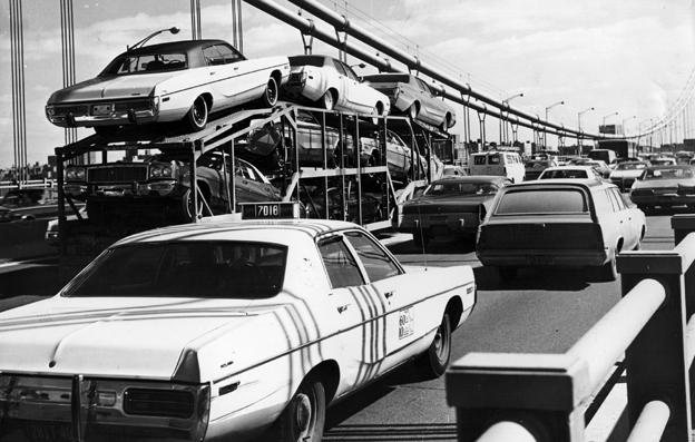 US cars on a road, 1975