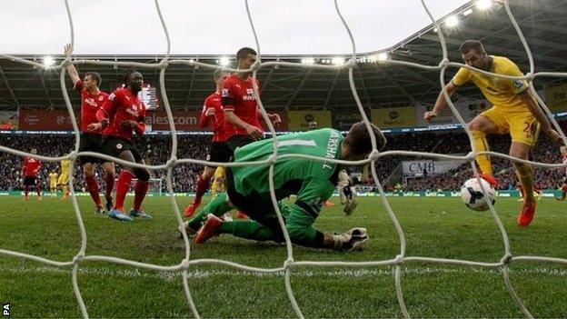 Crystal Palace's Joe Ledley scores his side's second goal in the 3-0 win at Cardiff