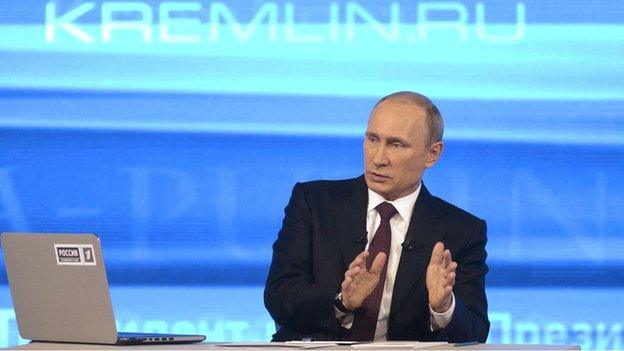 Russian President Vladimir Putin takes part in a TV show in Moscow, 17 April