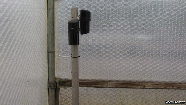 If the area inside the greenhouse is breached the infrared security system triggers an alarm