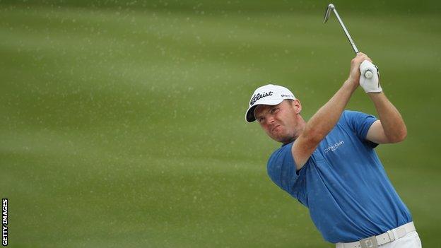 Michael Hoey play a bunker shot at the Malaysian Open