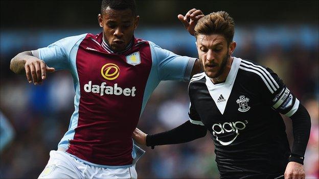 Leandro Bacuna and Adam Lallana