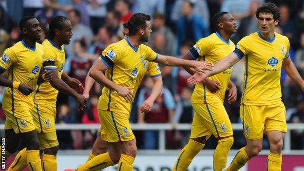 Mile Jedinak celebrates after scoring the winner against West Ham