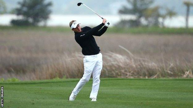 Luke Donald plays from the 18th fairway in round three of the RBC Heritage at Hilton Head