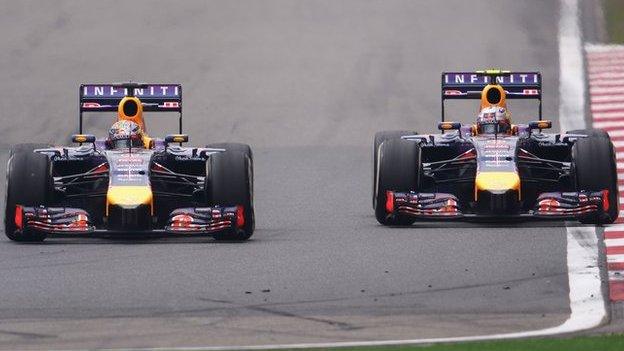 Sebastian Vettel of Germany and Infiniti Red Bull Racing competes with teammate Daniel Ricciardo of Australia and Infiniti Red Bull Racing during the Chinese Formula 1 Grand Prix.