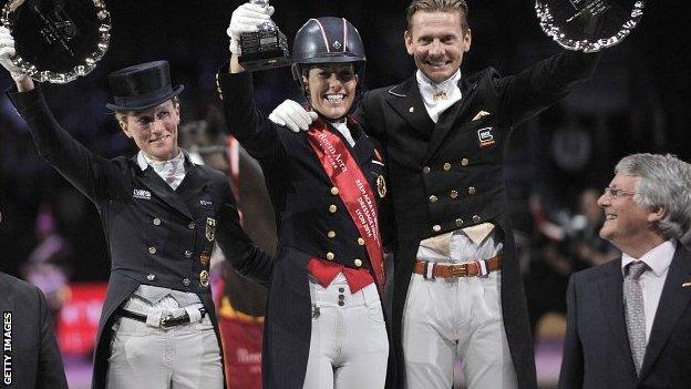 Germany's Helen Langehanenberg, Britain's Charlotte Dujardin (C), and Netherland's Edward Gal