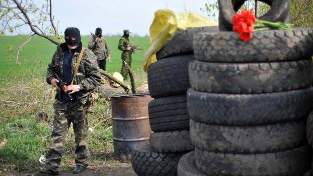 Pro-Russian gunmen at roadblock attacked on Sunday near Sloviansk