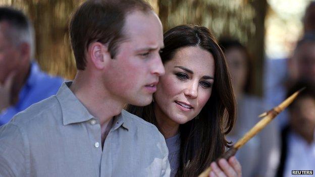 Duke and Duchess of Cambridge with aboriginal spear at Uluru