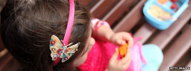 girl eating a snack