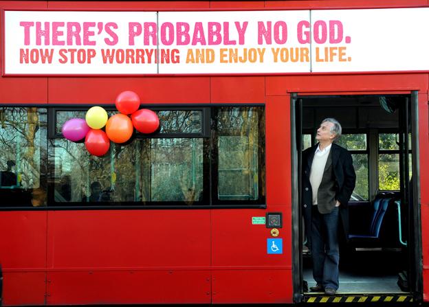 Richard Dawkins on bus displaying sign saying "There's probably no God"