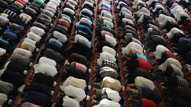 People praying in a mosque