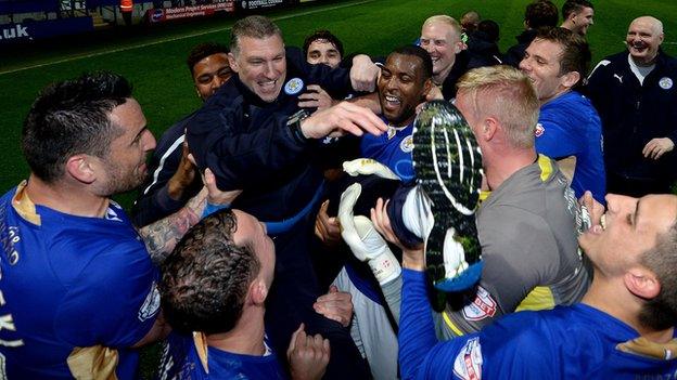 Leicester City players celebrate their Championship title success