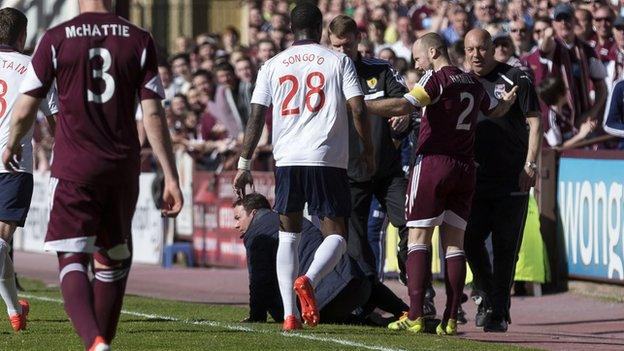 Jamie Hamill leaves Derek Adams on the ground