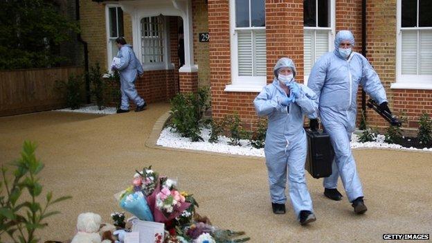 Police forensic officers were at the house in New Malden