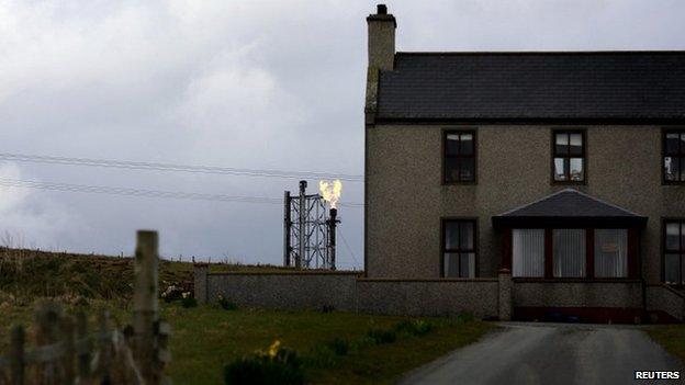 Gas terminal near house at Sullom Voe