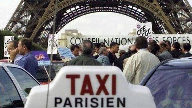 Taxi by the Eiffel Tower