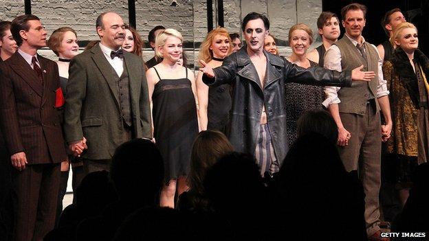 Michelle Williams and Alan Cumming (centre) with the rest of the Cabaret cast