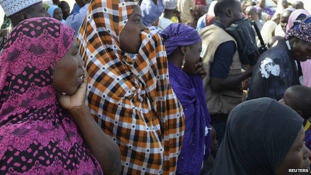Mothers of kidnapped school girls react during a meeting with the Borno State governor in Chibok - 22 April 2014