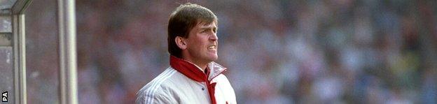 Kenny Dalglish in the dugout at Old Trafford