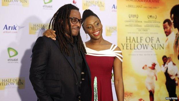 Director of Half of a Yellow Sun Biyi Bandele (l) and author Chimamanda Ngozi Adichie attend the film's premiere in Lagos on 12 April