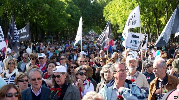 Tens of thousands fill Lisbon"s Liberdade Avenue in a march celebrating the 40th anniversary of the Carnation Revolution Friday, April 25