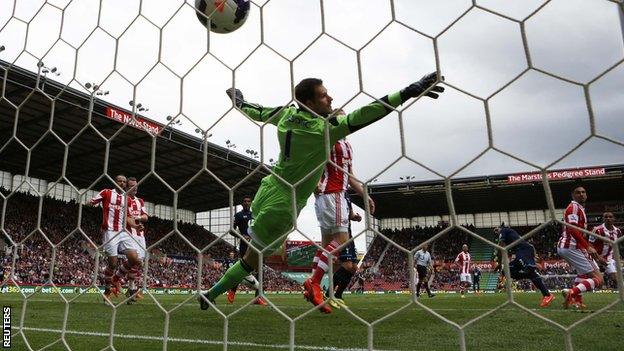 Danny Rose (third right) heads in a goal for Tottenham at Stoke