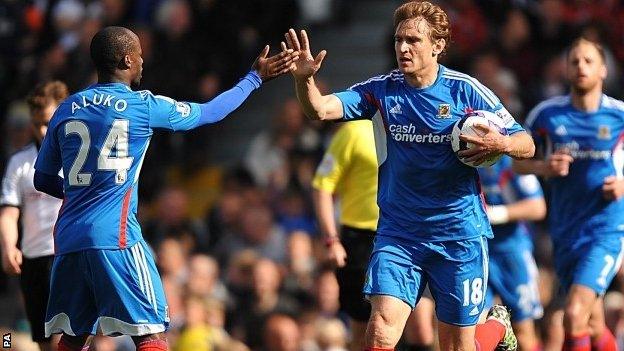 Nikica Jelavic celebrates a goal at Fulham