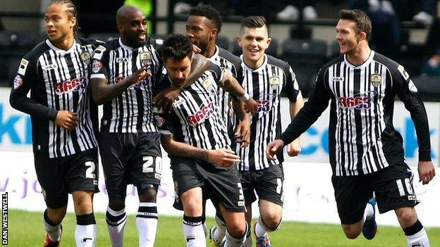 Alan Sheehan celebrates with Notts County team-mates