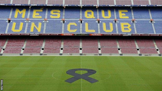 Barcelona have laid a black ribbon in the centre of the pitch at the Nou Camp.