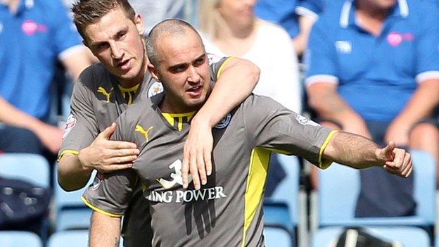 Gary Taylor-Fletcher (right) celebrates scoring for Leicester at Huddersfield