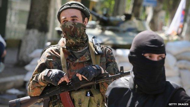 Pro-Russian gunmen in Sloviansk, eastern Ukraine. Photo: 26 April 2014