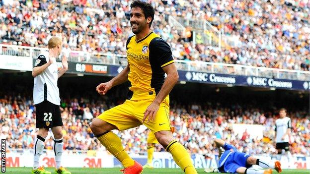 Raul Garcia scores for Atletico Madrid against Valencia