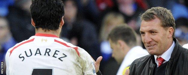 Liverpool manager Brendan Rodgers (right) and Reds striker Luis Suarez