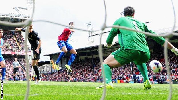 Edin Dzeko heads Manchester City into the lead against Crystal Palace