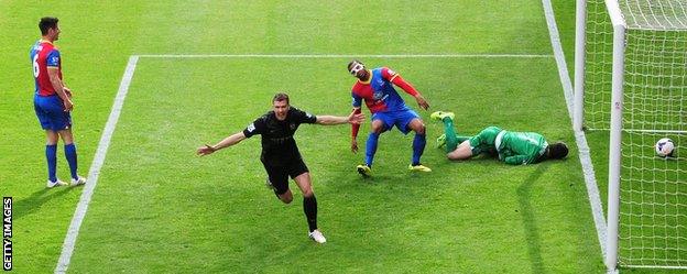 Edin Dzeko celebrates giving Manchester City the lead against Crystal Palace