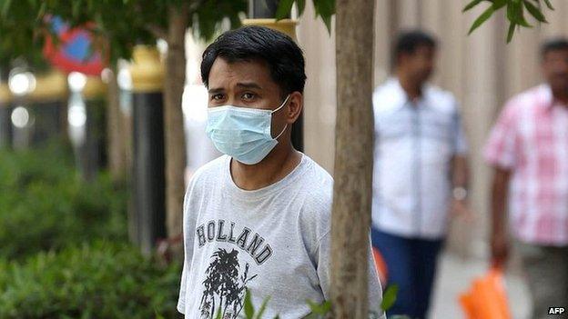 Man wears mouth and nose mask in the Red Sea coastal city of Jeddah. 27 April 2014